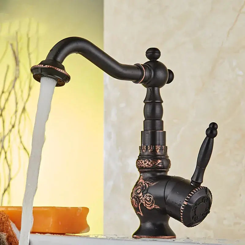 Antique black flower carved basin mixer tap with bronze finish, ornate rose engraving, and copper accents for bathroom use