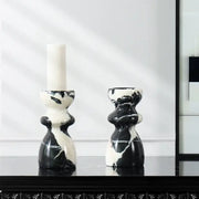 Elegant black and white marble candlestick holder with sculpted organic design for grand antique dining room decorbites grand antique