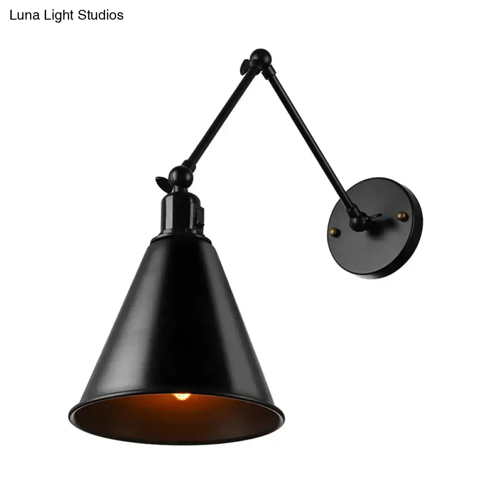 Black matte finished wrought iron adjustable direct wired wall sconce with conical shade and articulated arm by DecorBites