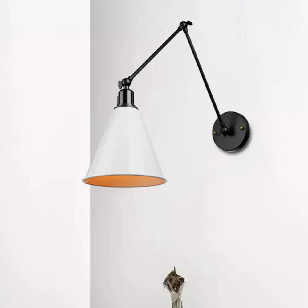 Black direct wired DecorBites™ wrought iron articulated wall sconce with white conical shade and orange interior