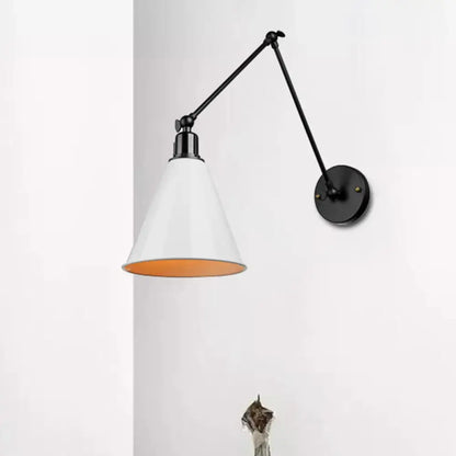 Black direct wired DecorBites™ wrought iron articulated wall sconce with white conical shade and orange interior