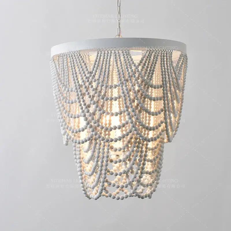 Antique black wood beaded pendant chandelier with white wooden bead strands for elegant dining room decorbites black wood