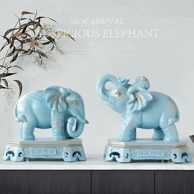 Antique blue elephant couple resin statue with intricate gold accents and ornate bases for living room decorbites decor
