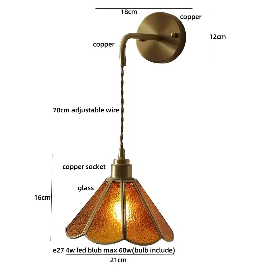 Antique brass-finished copper wall sconce with textured amber glass shade and adjustable 70cm twisted wire decorbites blue glass led