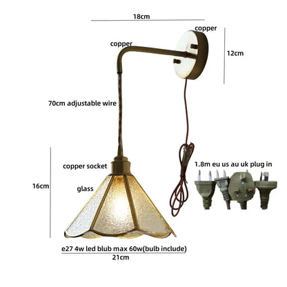 Antique-style copper wall sconce with textured blue glass led shade for staircases by decorbites blue glass