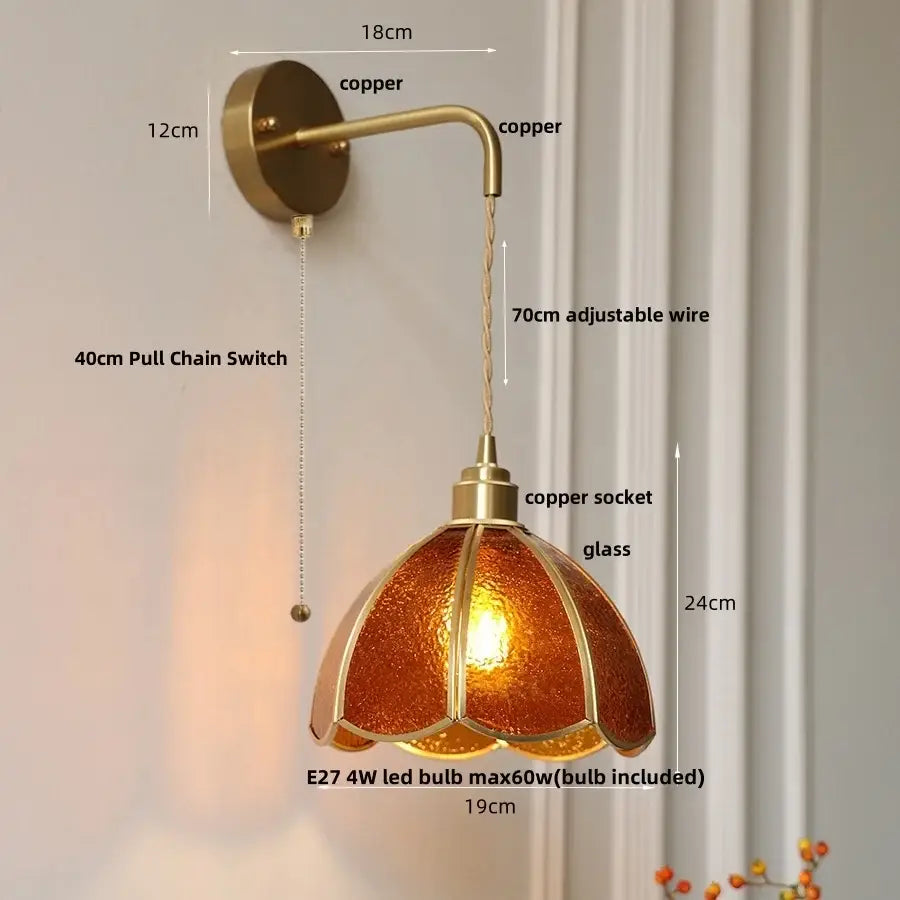 Copper-finished wall light with decorbites amber glass led shade shaped like an open flower for bedroom sconce lighting