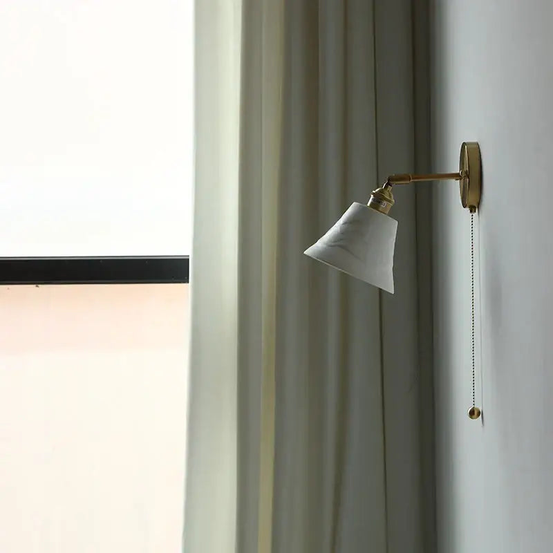 Minimalist antique brass wall light with white ceramic led shade and pull chain for bedroom decorbites ceramic led wall use