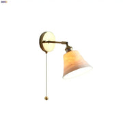 Antique brass and amber glass adjustable wall light with warm shade for bedroom decorbites ceramic led wall use