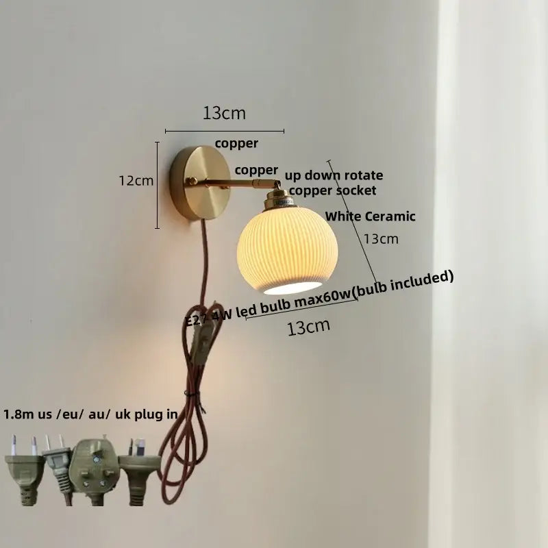 Antique brass and amber glass adjustable wall light with copper arm and decorbites ceramic led white ridged lampshade