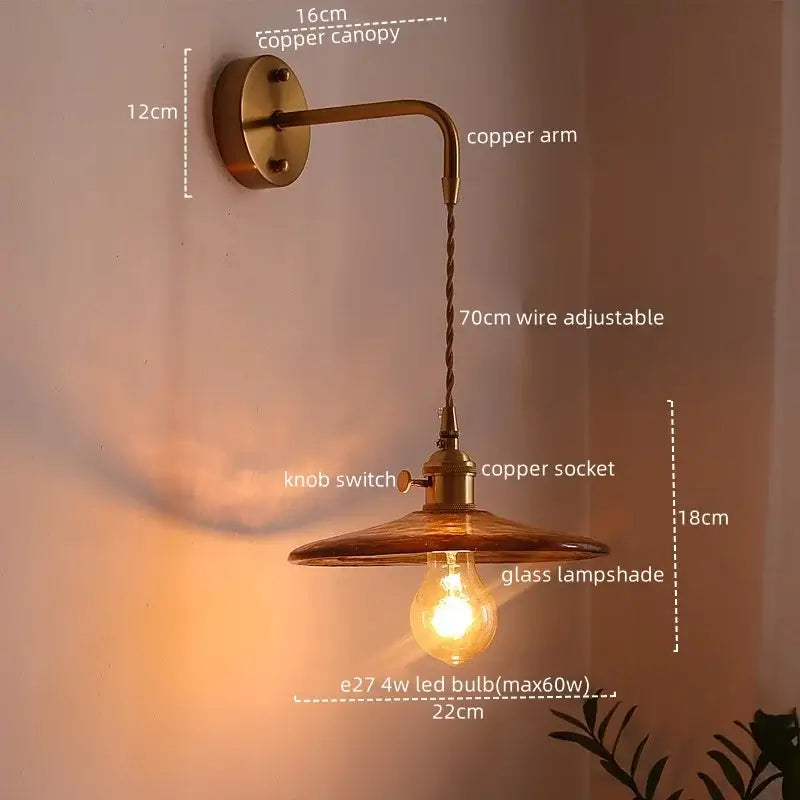 Antique brass copper led wall light with amber glass lampshade and exposed LED bulb for bedroom lighting