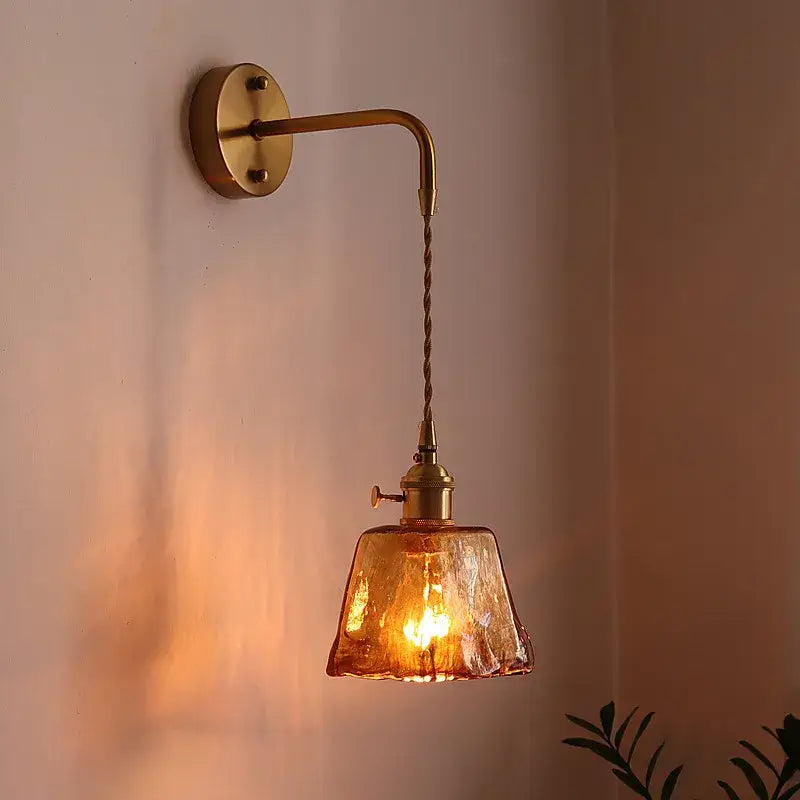 Antique brass wall lights with textured amber glass copper led shade and twisted cord for bedroom lighting