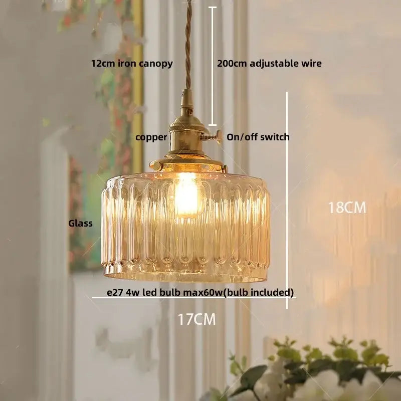Antique brass and amber glass led pendant light with ribbed glass and adjustable wire suspension for stair lighting