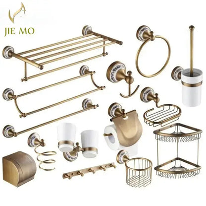 Antique brass and ceramic bathroom accessories set with ornate ceramic accents and matching hardware by decorbites bathroom accessories