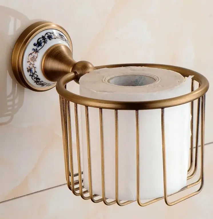 Antique brass toilet paper holder with blue floral ceramic plate from decorbites bathroom accessories set