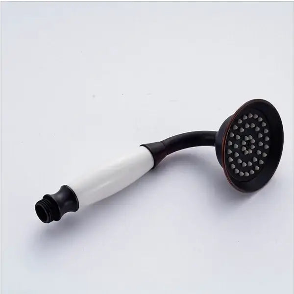 Antique brass and chrome hand shower head with curved handle ceramic grip and brass nozzle for bathroom use