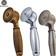 Three stylish hand shower heads in antique brass polished chrome and brushed nickel with wooden textured handles