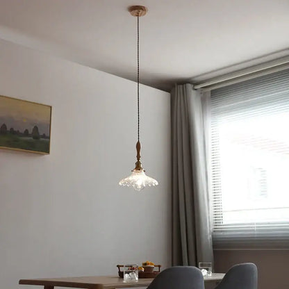 Antique brass and glass led pendant lamp with ornate clear glass shade and brass finish for kitchen lighting