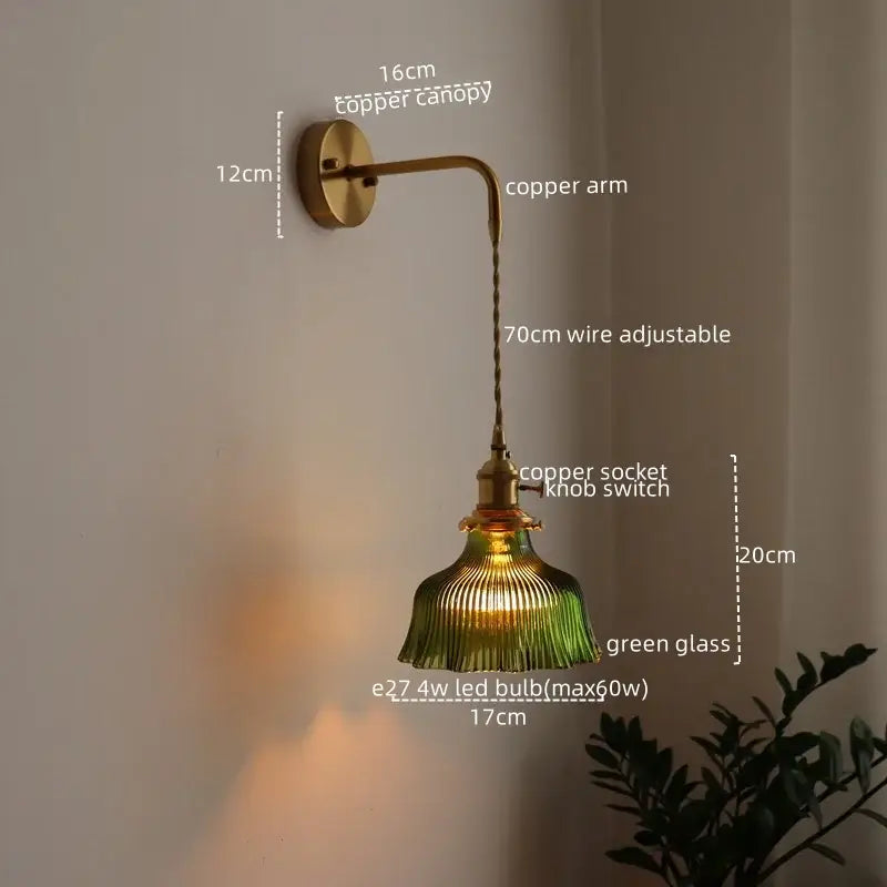 Antique brass wall lamp with green ribbed glass shade and adjustable arm featuring decorbites led pull chain design