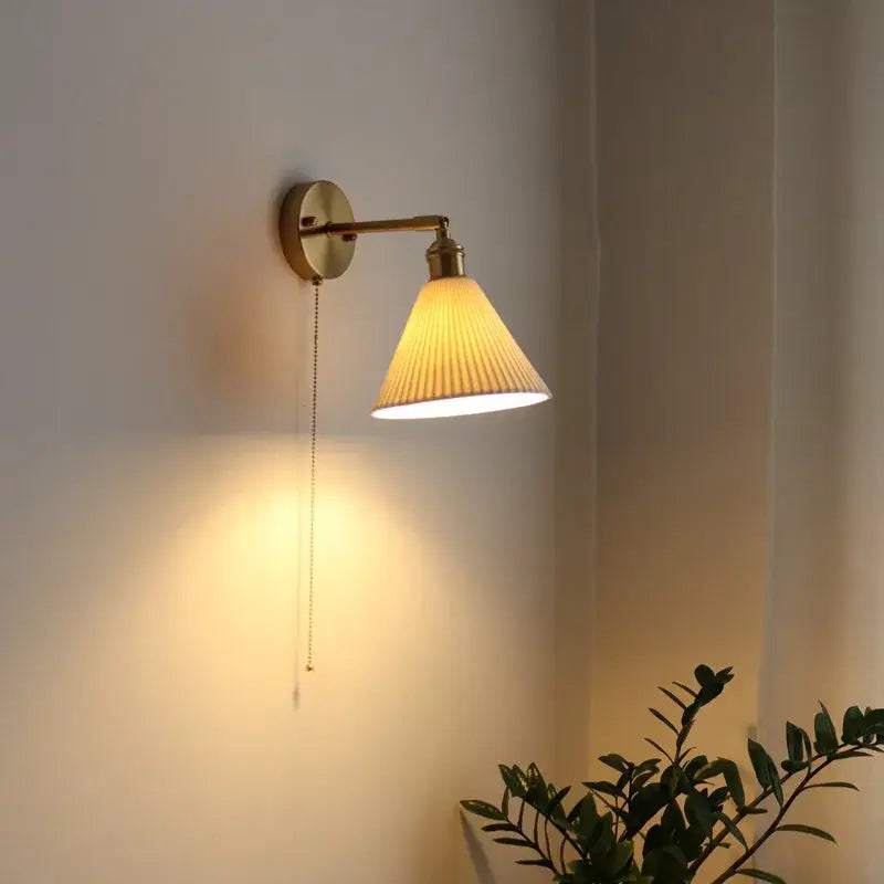 Antique brass wall lamp with pleated cream fabric shade and pull chain for decorbites ceramic copper led lighting