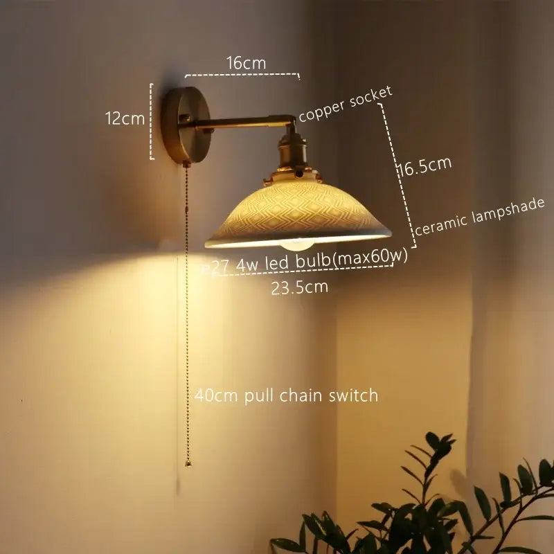 Antique brass wall lamp with decorbites ceramic copper socket and pull chain switch featuring embossed ceramic lampshade