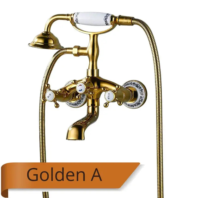 Antique brass and white ceramic bathtub shower faucet set with golden brass faucet and blue-patterned porcelain handles