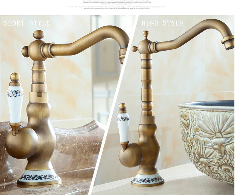 Antique brass basin faucet with ornate detailing and white ceramic handles featuring blue floral patterns