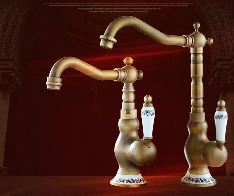 Antique brass basin faucet with ornate ceramic handles and decorative base for elegant kitchen use