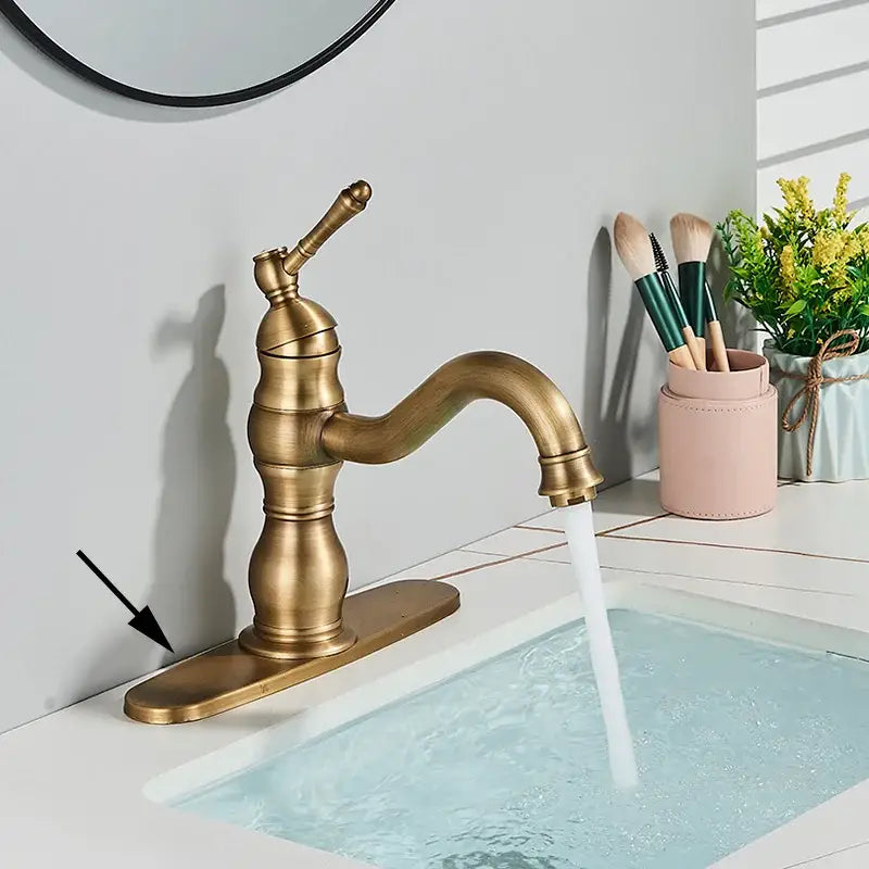 Antique brass basin faucet with single handle, swivel curved spout, and decorative base for bathroom decorbites brass basin