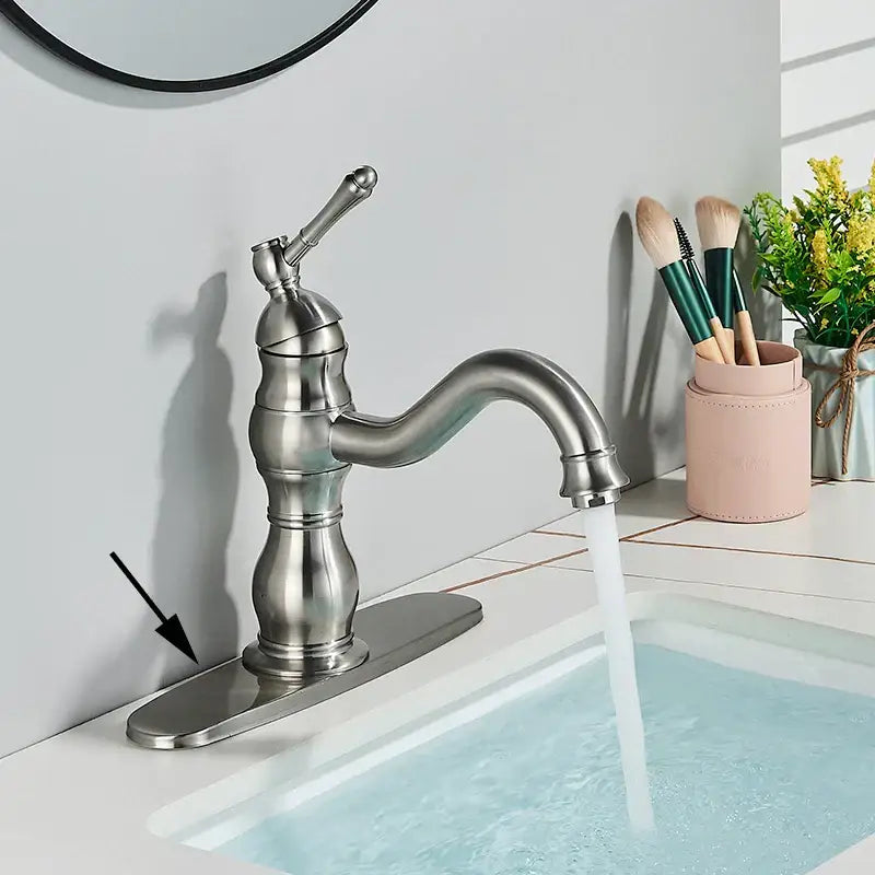 Stylish brushed nickel basin faucet with single handle curved spout and decorative base for bathroom use decorbites brass basin