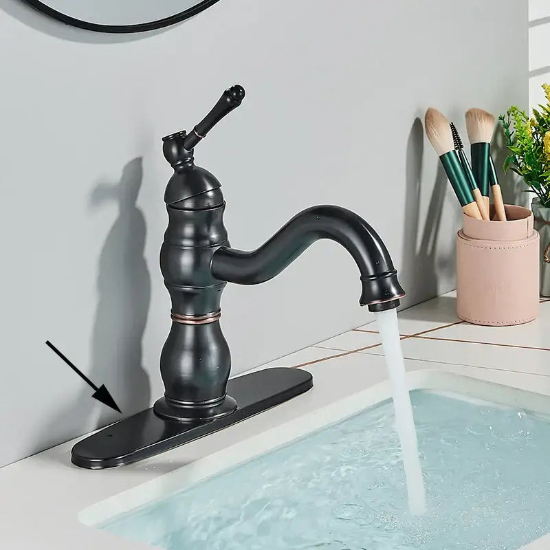 Black matte basin faucet with curved spout and vintage brass basin faucet design for bathroom decorbites style