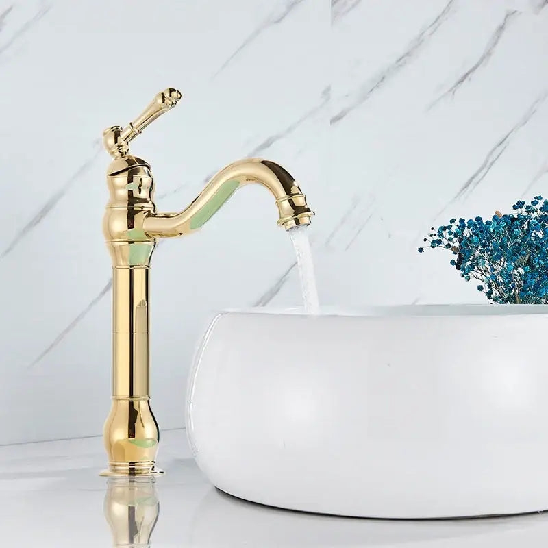 Antique brass basin faucet with golden brass finish, vintage curved spout, and ornate single handle decorbites brass basin