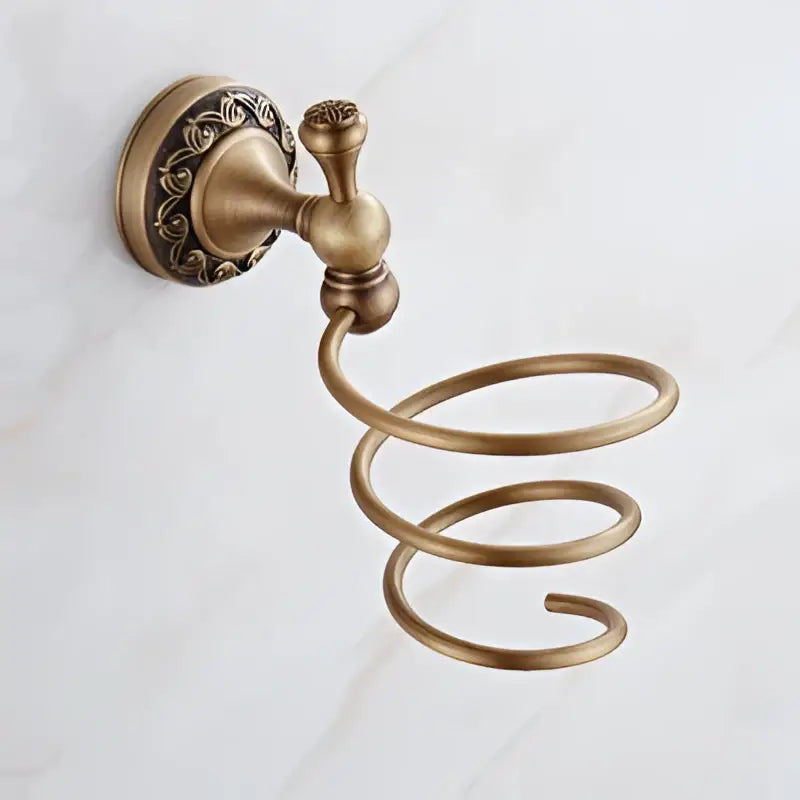 Antique brass bath hardware towel ring with ornate scrollwork and coiled spiral design in brass antique bath decorbites style