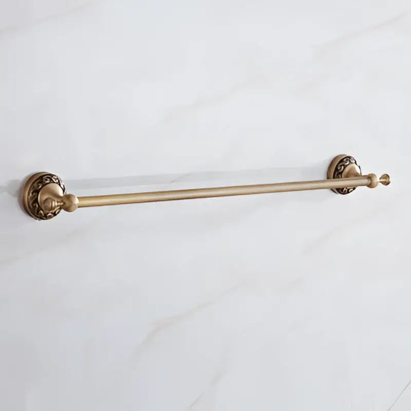 Antique brass bath hardware towel rack with ornate circular end caps and polished finish for vintage bathroom decorbites brass antique