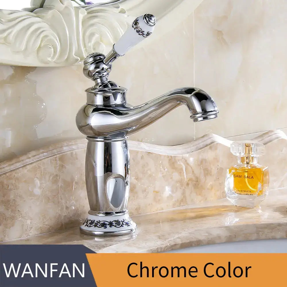 Chrome-finished brass bathroom basin water mixer with ornate curved spout and white ceramic handle with black floral detailing