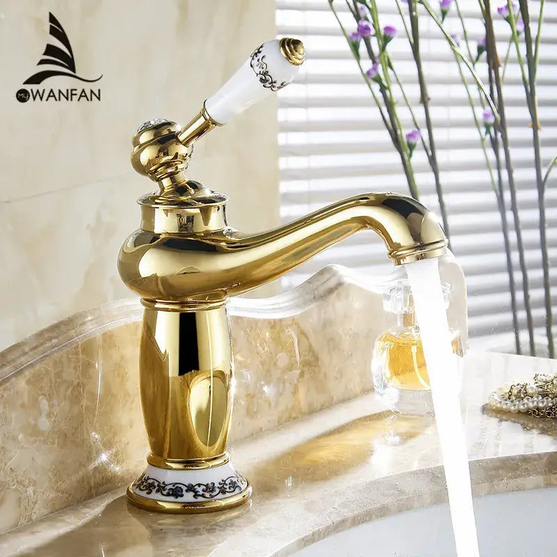 Antique brass bathroom basin water mixer with gold finish and white ceramic handle featuring black ornate decorbites brass bathroom details by wanfan