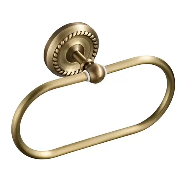 Antique brass towel ring with decorative rope border as part of decorbites brass bathroom set with ceramic brush cup