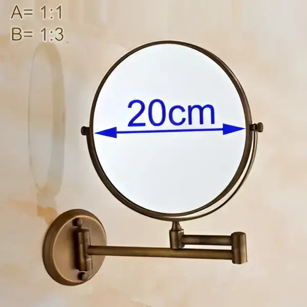 Brass-finished wall-mounted magnifying mirror with 20cm diameter and adjustable arm from decorbites brass bathroom set
