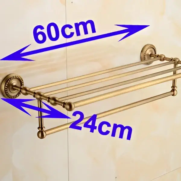 Antique brass double-tiered towel rack with ornate spherical finials from decorbites brass bathroom set