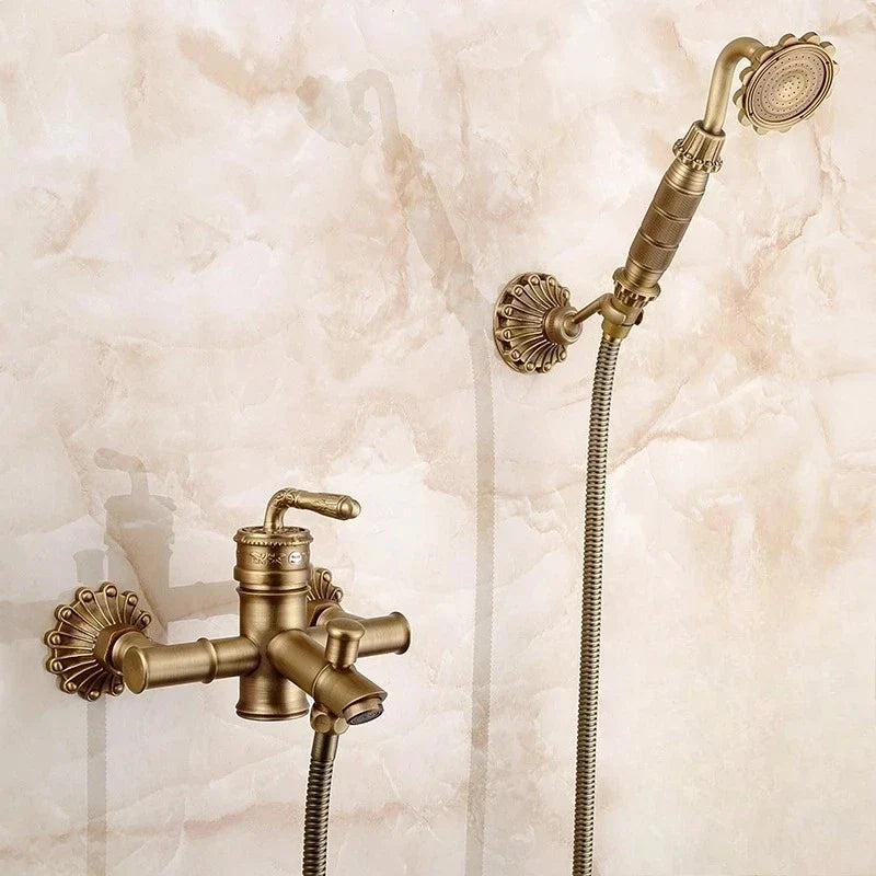 Antique brass bathtub shower set featuring vintage-style shower faucet and handheld sprayer in brass finish