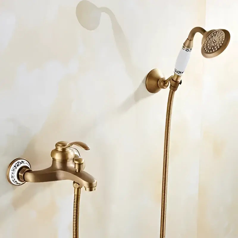 Antique brass bathtub shower set with ceramic handles and decorative porcelain accents brass shower set for bathroom decorbites