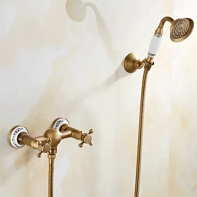 Antique brass bathtub shower set with ceramic handles and matching handheld spray head for elegant bathroom decorbites brass bathtub use