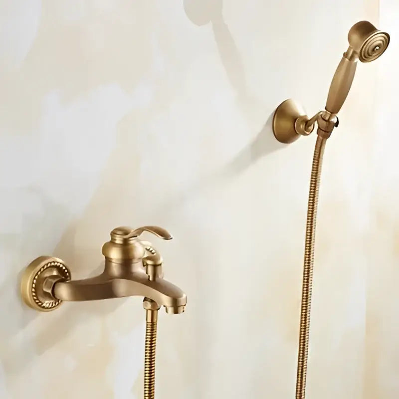 Antique brass bathtub shower set with ceramic handles featuring a brass-finished faucet and handheld showerhead for bathroom decorbites brass bathtub use