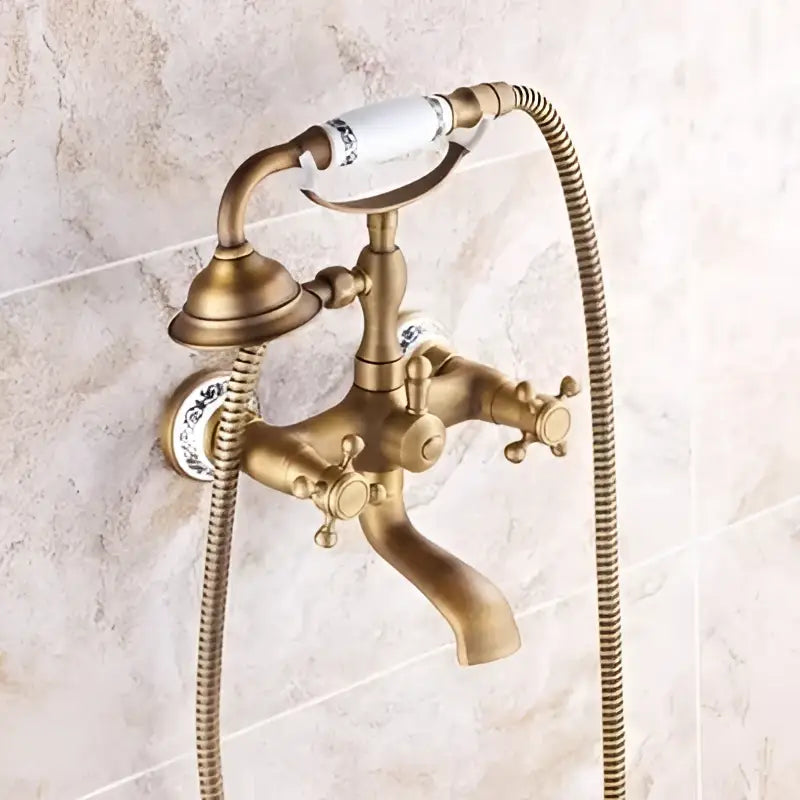 Antique brass bathtub shower set with ceramic handles and ornate detailing for elegant bathroom decorbites brass bathtub mixer