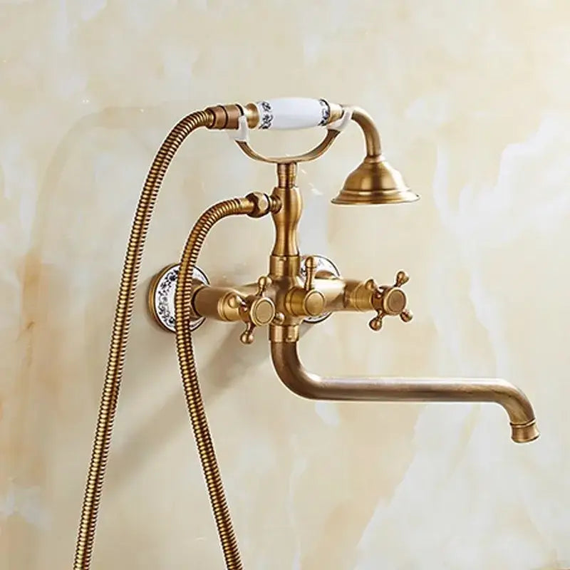 Antique brass bathtub shower set with ceramic handles featuring a curved spout and flexible braided hoses for decorbites brass bathtub