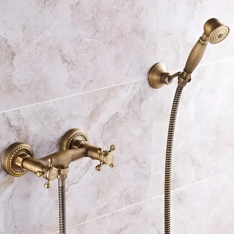 Antique brass bathtub shower set with ceramic handles and detachable handheld showerhead in a brass finish decorbites brass bathtub shower