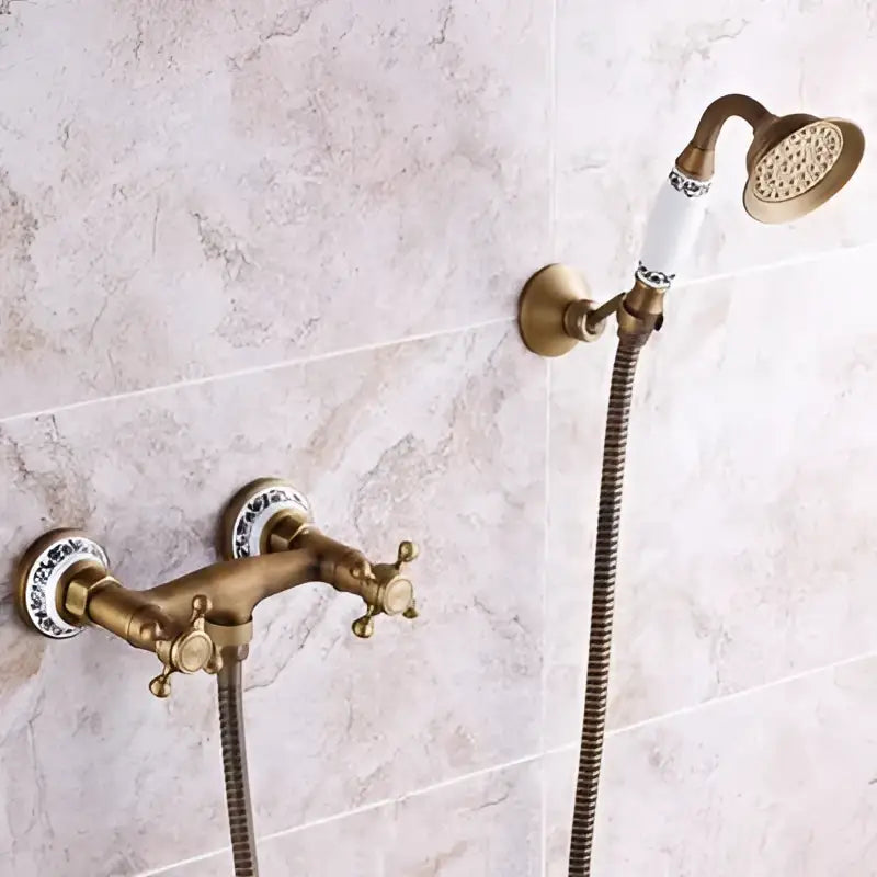 Antique brass bathtub shower set with white ceramic handles and blue floral patterns for bathroom decorbites brass bathtub
