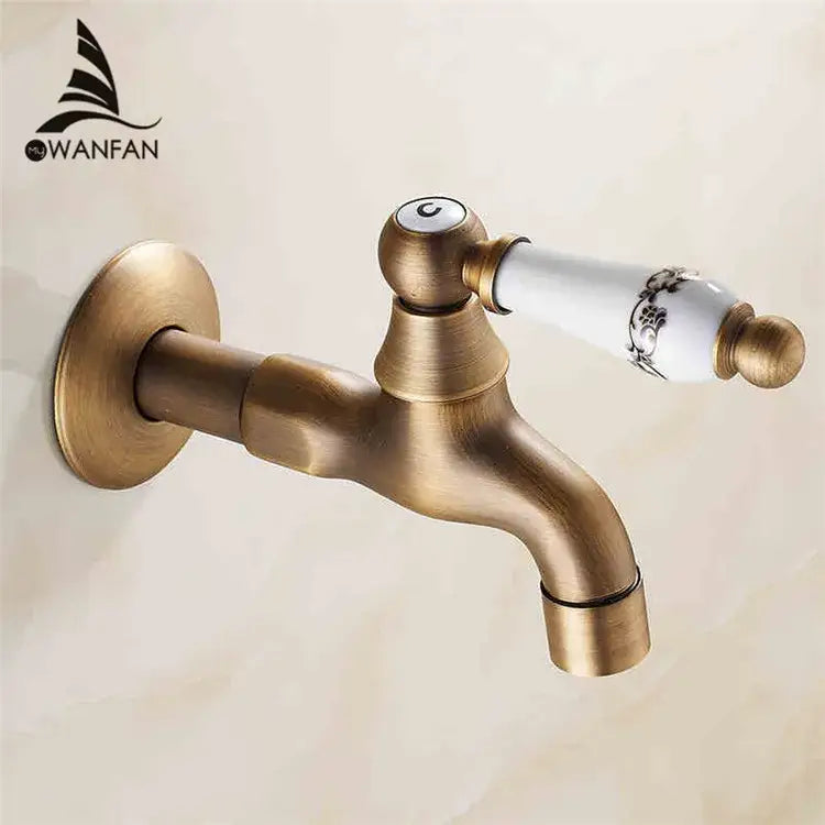 Antique brass bibcock faucet with decorbites brass antique finish and white floral ceramic handle garden tap