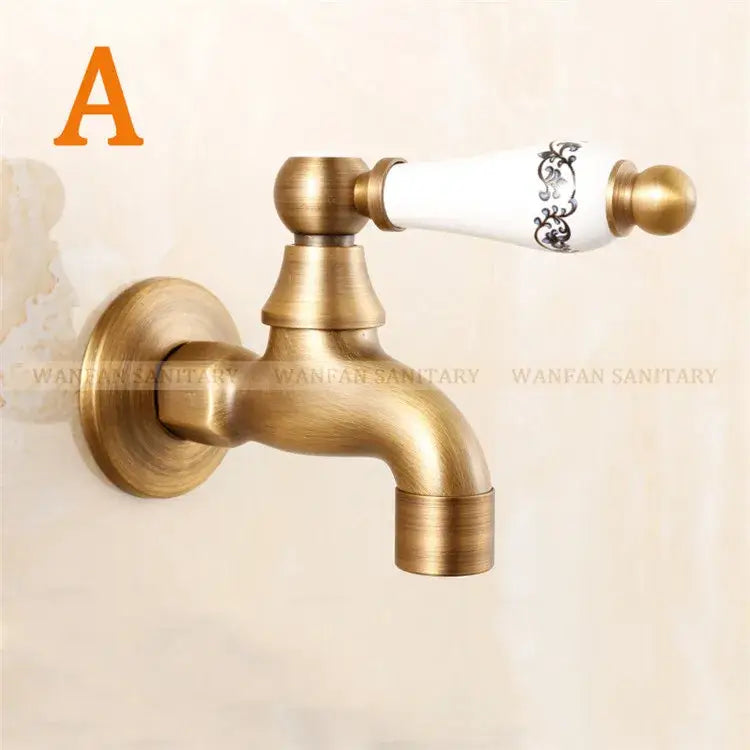 Antique brass bibcock faucet with white ceramic handle featuring black ornate floral patterns for garden tap decorbites brass antique