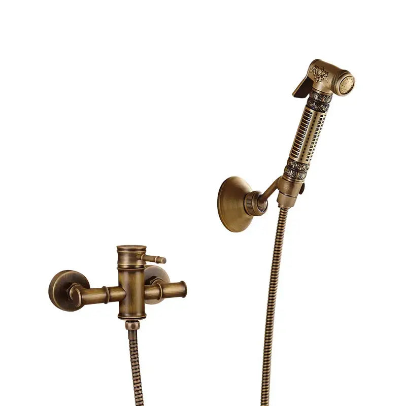 Antique brass bidet mixer faucet bathroom handheld shower set with ornate detailing and flexible hose in brass finish