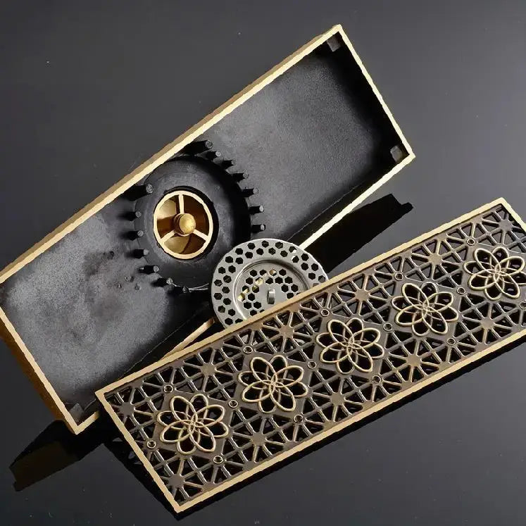 Bronze antique brass carved floor drain cover with intricate floral and geometric patterns for bathroom drainage